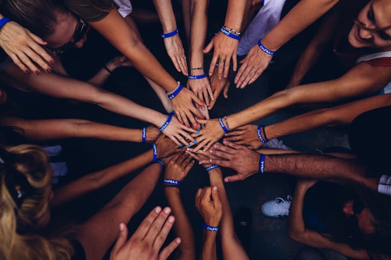 Hands joined together in civil-society work